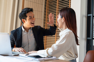 Businessmen celebrate success together
