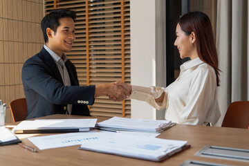 Businessmen giving a handshake