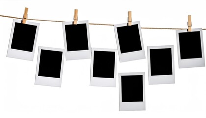 Blank photos hang on a clothesline