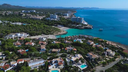 Stunning drone footage of luxury real estate developments near Cala Murada in Mallorca, Balearic Islands.
