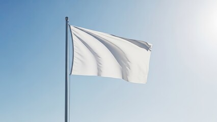 White flag waving in the clear blue sky