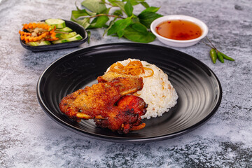 Spicy roasted chicken wing with rice