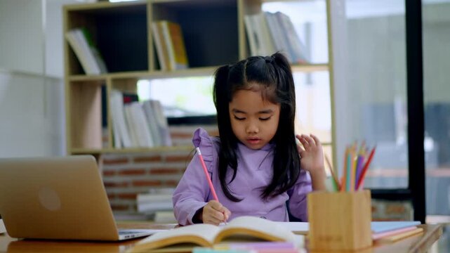 Studying child focused on homework in modern home office educational content calm environment close-up view learning experience