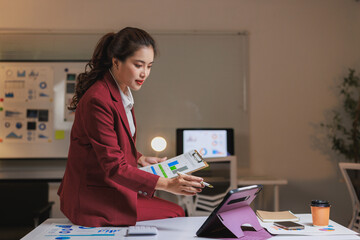 Businesswoman deeply focusing on financial data analysis