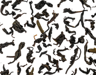 Loose, dark, curled tea leaves on black
