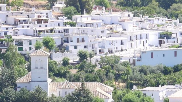 White houses and the church tower of Mecina Fondales, in La Taha (Alpujarra Granadina).