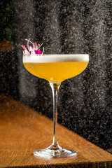 Elegant yellow cocktail with garnish