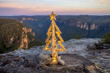 Upper Blue Mountains Christmas Xmas tree on cliff with valley