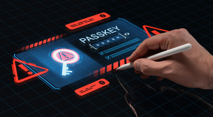 Hand holding stylus interacting with digital passkey hologram on futuristic HUD interface with warning signs and secure access concept on screen.