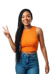 Young afro-latin woman with long box braids and an orange crop top smiling, making a peace sign in a crisp high-key studio portrait with copy space. concept of youthful confidence
