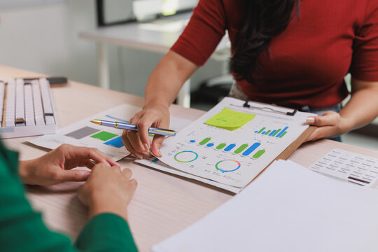 Business professionals analyzing financial data and growth strategy - Powered by Adobe