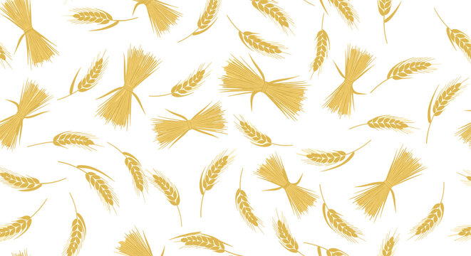 Seamless pattern of golden wheat stalks and sheaves on a white background.