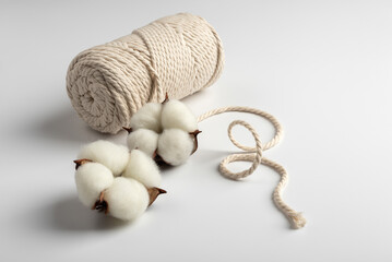 Organic Cotton Flowers and Rope on White Background
