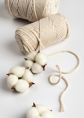 Organic Cotton Flowers and Rope on White Background