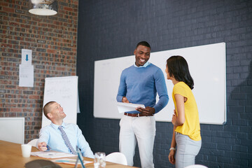 Creative, happy people and laughing with team in meeting for funny joke or presentation in office. Employees, colleagues or discussion with smile for project proposal, humor or comedy in workplace