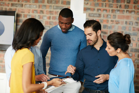 Media agency, meeting and people in office, tablet and planning for creative project. Group, men and women with discussion, teamwork and internet with subscription campaign and feedback for proposal