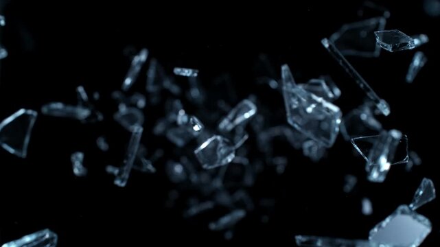Super Slow Motion Shot of Breaking Real Glass at 1000 fps . Isolated on Black Background