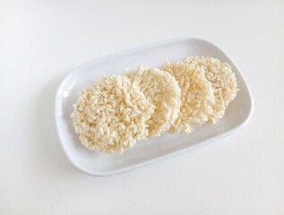 Rengginang or traditional rice cracker, Indonesian traditional snacks made from glutinous rice, savory and crunchy.