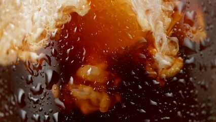 Macro Shot of Pouring Milk into Ice Coffee, Close-up