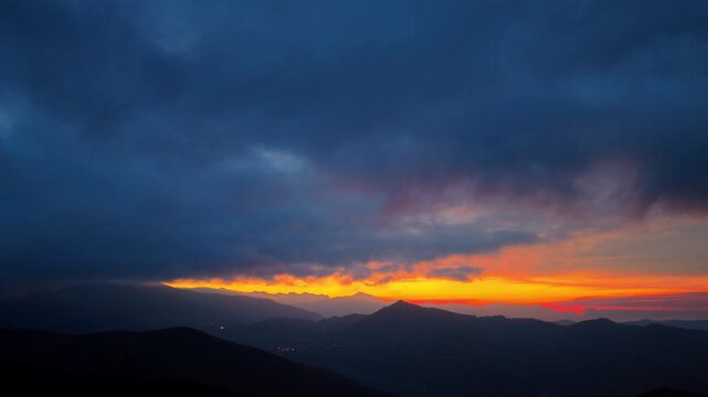Mountain Sunset Hyperlapse with Dramatic Clouds and Colorful Sky