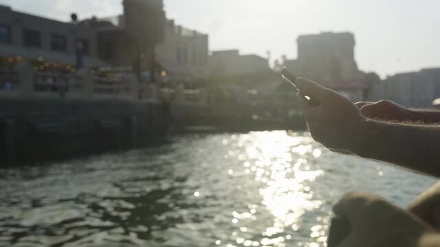 Tourists Enjoying Traditional Abra Boat Ride on Dubai Creek