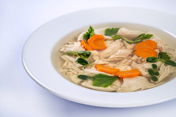 Chicken aspic with carrot slices in clear jelly