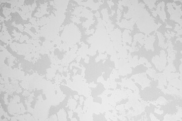 Light gray textured surface with subtle patterns in a modern space