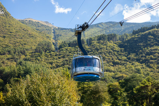 Funivia Malcesine - Monte Baldo cable car in the Italian mountains, with a cabin in view, connecting Lake Garda town to Monte Baldo summit for scenic travel
