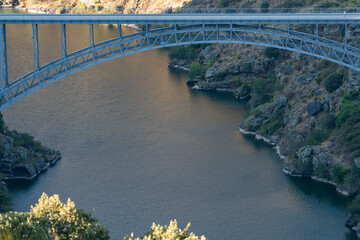 Scenic Bridge Over Serene River Canyon Landscape