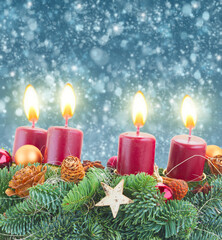advent wreath with burning candles