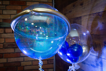 Bright multi-colored inflatable balloons for holiday decoration.