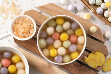 Colorful sweet glutinous rice balls tangyuan in sweet ginger syrup soup