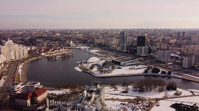 A drone flies over Minsk's Nemiga district in winter.