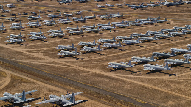 Aerial view of rows of retired aircraft baking under the desert sun at the Davis-Monthan Air Force Base AMARG, Tucson, Arizona, United States.