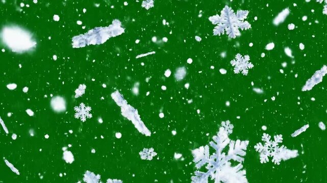 Animated Falling Snowflakes over Green Background Creating a Festive Winter Scene