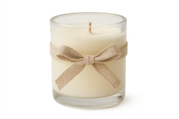 Cream-colored candle in clear glass jar tied with beige ribbon