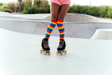 Beautiful woman skating with roller skates and having fun.