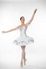 Naklejka premium Studio portrait of a ballerina in a white tutu
