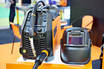 Inverter welding devices and protective helmets