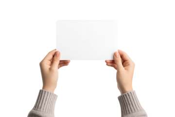 Female hands in a sweater holding a blank white horizontal card or sign for mockup isolated on a white background