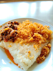 Traditional Indonesian Grilled Sticky Rice with Savory Coconut Flakes