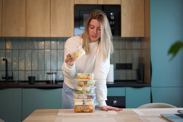 Checking Prepared Meal Above a Balanced Stack