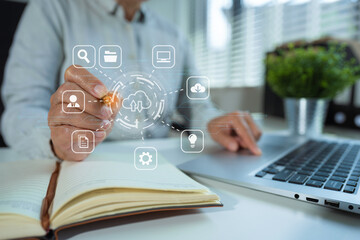 Business wooman is using a laptop to access the cloud computing system , Storage and data transfer Cloud network , Cloud technology. Networking and internet service concept.