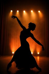 A silhouette of a classical dancer in a dancing pose