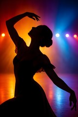A silhouette of a classical dancer in a dancing pose