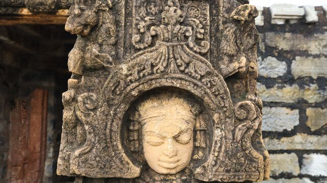India, Chhattisgarh, Sirpur, Ancient Carved Faces of Hindu and Buddhist Deities on the Surang Tila, The World UNESCO Site.