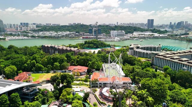Sentosa Island beach aerial shot showing coastline, sandy shore, and relaxing vacation atmosphere