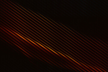 Abstract diagonal parallel lines with warm orange and yellow glow against dark background