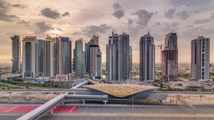 Aerial top view to Sheikh Zayed road during sunrise near Dubai Marina and JLT timelapse, Dubai.