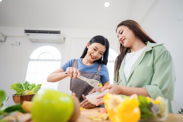 Friends prepare healthy snacks together in a bright kitchen during the afternoon